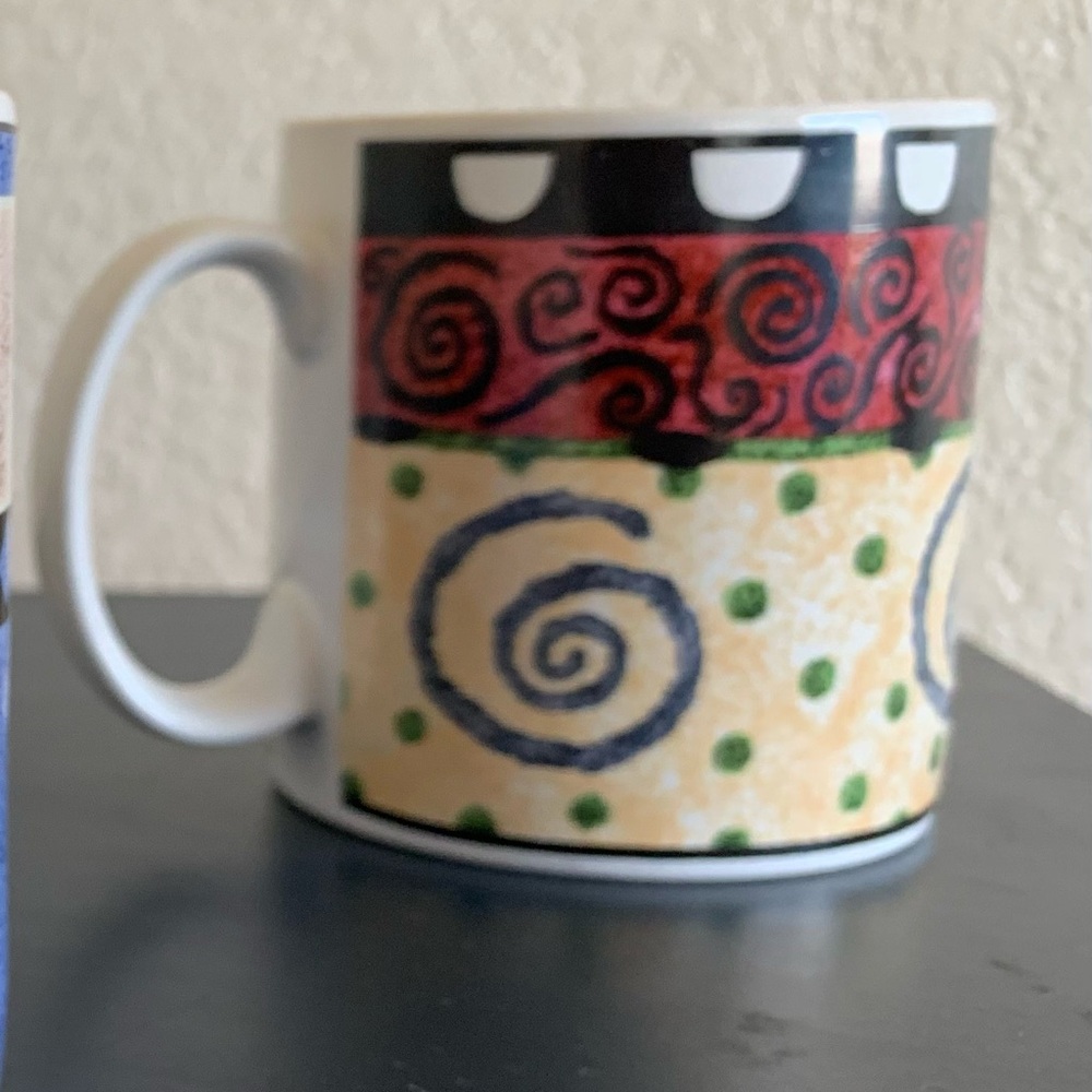 Vintage Sakura Mug it has the Confetti pattern by John Zak Stoneware .